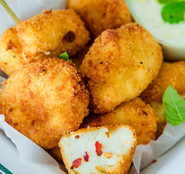 Croquetas aux calamars et au piment Magimix.