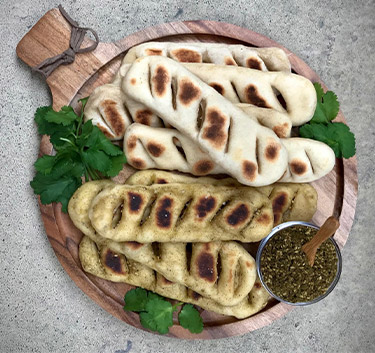 Petits pains plats au zaatar Magimix.